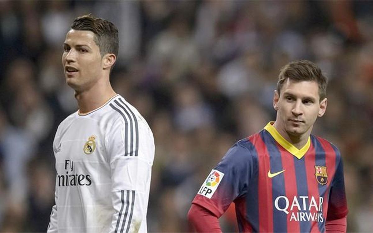 Cristiano Ronaldo y Leo Messi durante un clásico de la Liga 2013-14 Cristiano Ronaldo y Leo Messi durante un clásico de la Liga 2013-14