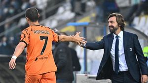 Pirlo junto a Cristiano Ronaldo Pirlo junto a Cristiano Ronaldo