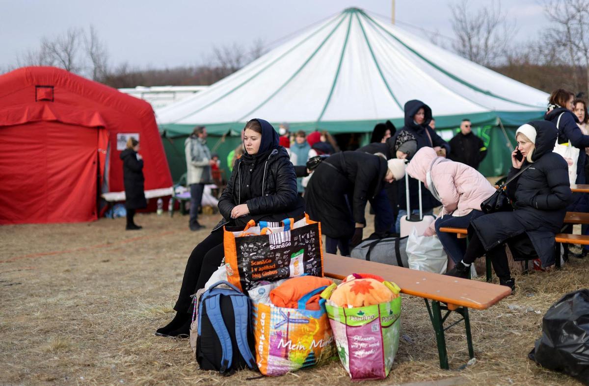 Refugees fleeing from Russian invasion of Ukraine cross Ukrainian-Slovakian border in Vysne Nemecke