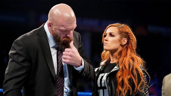 Becky Lynch y Triple H Becky Lynch y Triple H