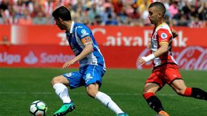 Javi López, perseguido por Borja García en una jugada del Girona-Espanyol del pasado curso. Javi López, perseguido por Borja García en una jugada del Girona-Espanyol del pasado curso.
