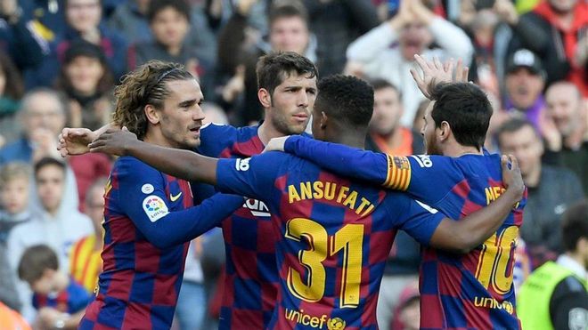 Griezmann celebra su gol con los compañeros Griezmann celebra su gol con los compañeros