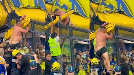 ¡Un aficionado de Boca, semidesnudo atrapado en la grada! Volvió la liga en Argentina con imágenes surrealistas