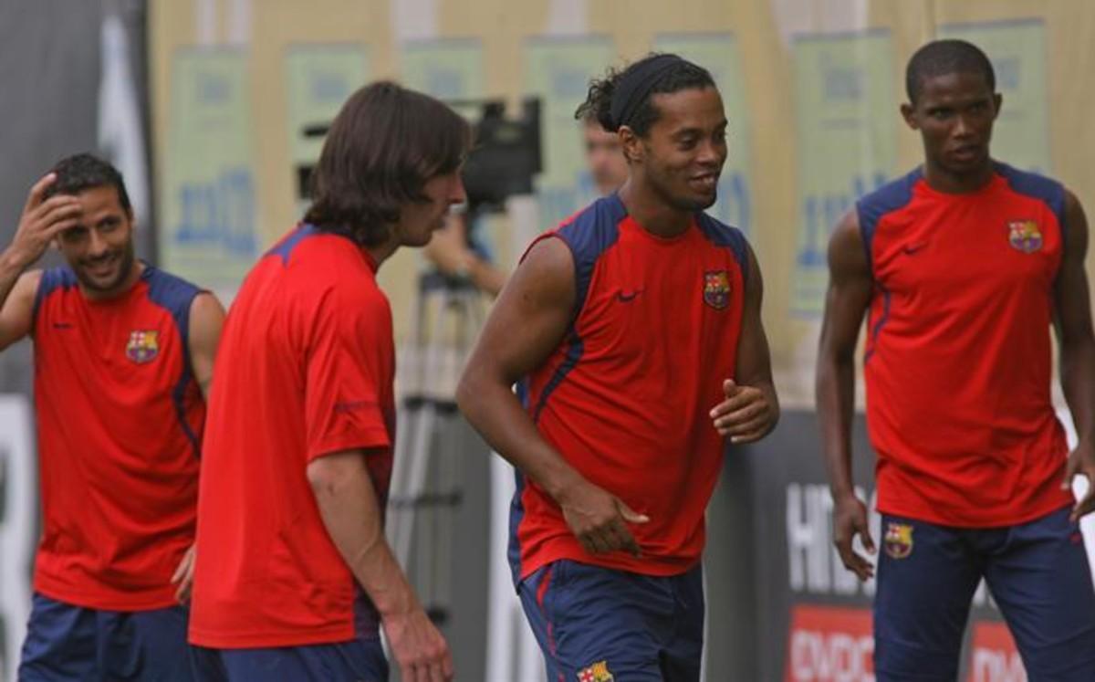 Messi, entre Giuly, Ronaldinho y Etoo