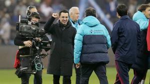 Xavi celebra la consecución de la Supercopa de España ante el Real Madrid