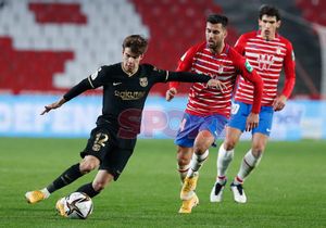 Riqui Puig durante el partido de cuartos de final de la Copa del Rey entre el Granada y el FC Barcelona disputado en el Nuevo los Cármenes Riqui Puig durante el partido de cuartos de final de la Copa del Rey entre el Granada y el FC Barcelona disputado en el Nuevo los Cármenes