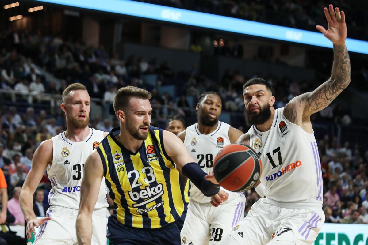 Marko Guduric of Fenerbahce Istanbul and Vicent Poirier of Real Madrid in action during Turkish Airlines Euroleague basketball match between Real Madrid and Fenerbahce Beko Istanbul at Wizink Center on December 2022 in Madrid, Spain.