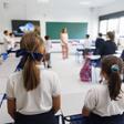 Varios niños en un aula del colegio CEU San Pablo de Sanchinarro, el primer día de curso escolar, a 6 de septiembre de 2023, en Madrid (España).