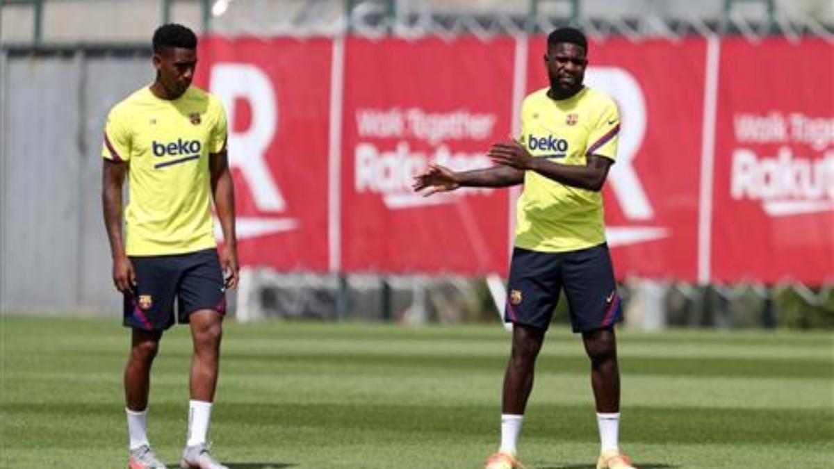 Junior y Umtiti en un entrenamiento con el Fútbol Club Barcelona