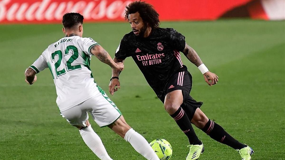 Marcelo frente a Rigoni en una acción del Elche - Madrid Marcelo frente a Rigoni en una acción del Elche - Madrid