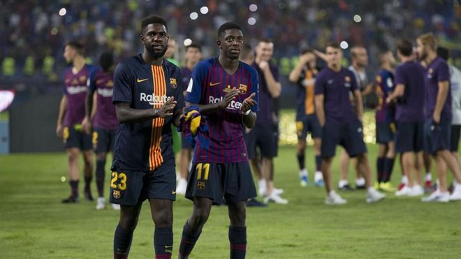 Dembelé celebra la victoria junto a Umtiti Dembelé celebra la victoria junto a Umtiti