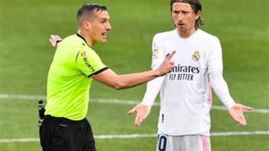 Estrada Fernández, junto a Modric Estrada Fernández, junto a Modric