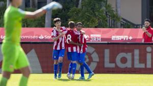 Los jugadores del Atlético celebran un gol contra el Valencia