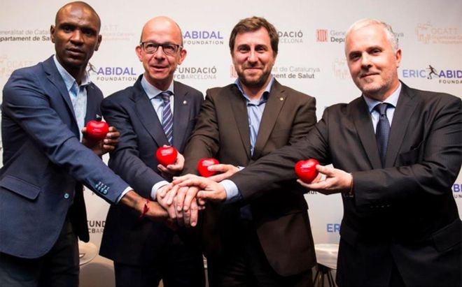 Eric Abidal, Jordi Cardoner, Antoni Comín y Jaume Tort, durante el acto en el Camp Nou Eric Abidal, Jordi Cardoner, Antoni Comín y Jaume Tort, durante el acto en el Camp Nou