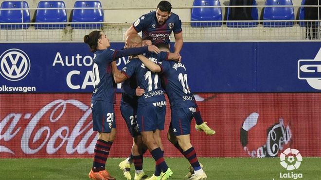 Los jugadores del Huesca celebran un gol Los jugadores del Huesca celebran un gol