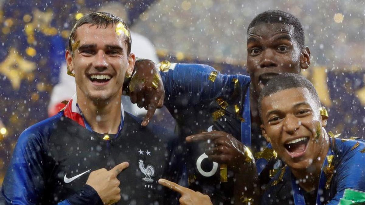 Griezmann, celebrando el título con sus compañeros Griezmann, celebrando el título con sus compañeros