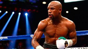 Floyd Mayweather en un combate de boxeo Floyd Mayweather en un combate de boxeo