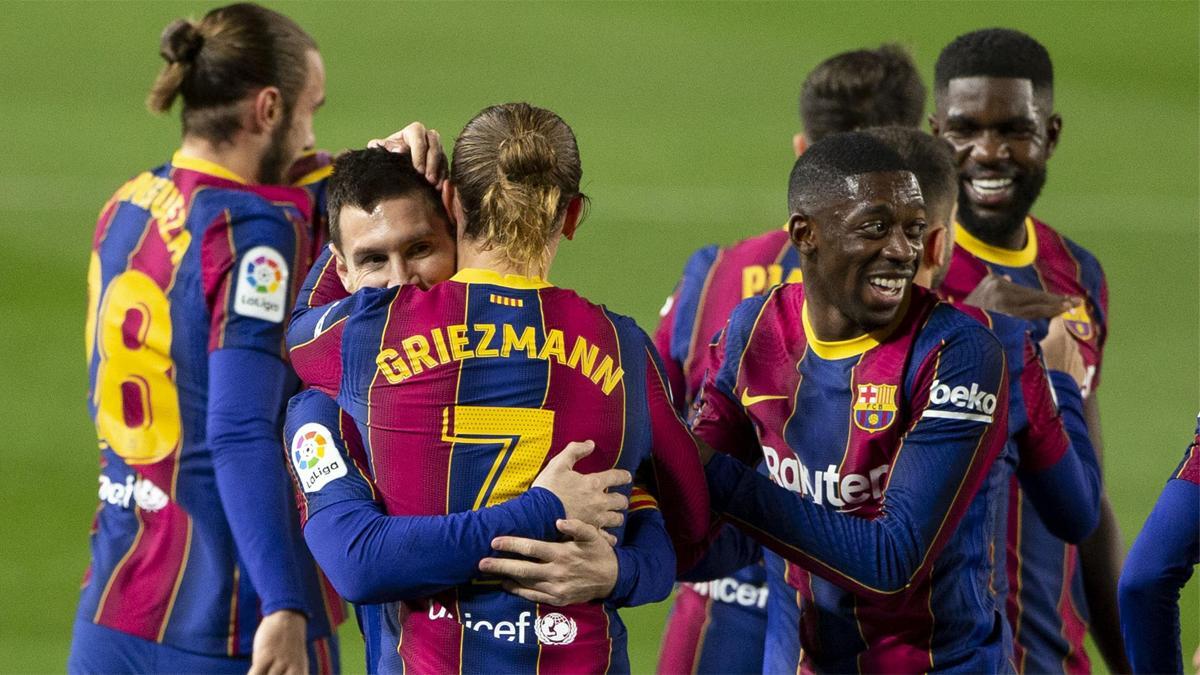Messi y Griezmann celebran el segundo tanto ante el Athletic