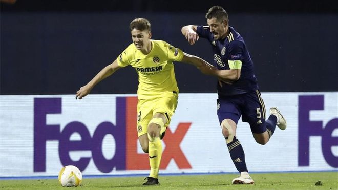 Juan Foyth disputa un balón con el jugador del Dinamo de Zagreb Arijan Ademi. Juan Foyth disputa un balón con el jugador del Dinamo de Zagreb Arijan Ademi.