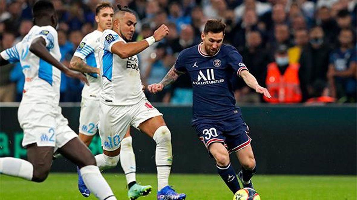 Leo Messi perseguido por los jugadores del Olympique de Marsella Leo Messi perseguido por los jugadores del Olympique de Marsella