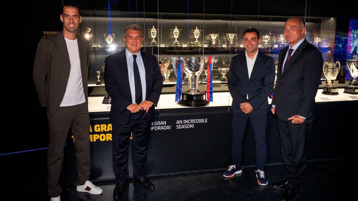 New FC Barcelona Museum receives La Liga trophy, presented by Laporta, Xavi, and Busquets